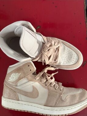Jordan’s High-Top Sneakers in Beige and White